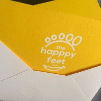THEHAPPPYFEET logo